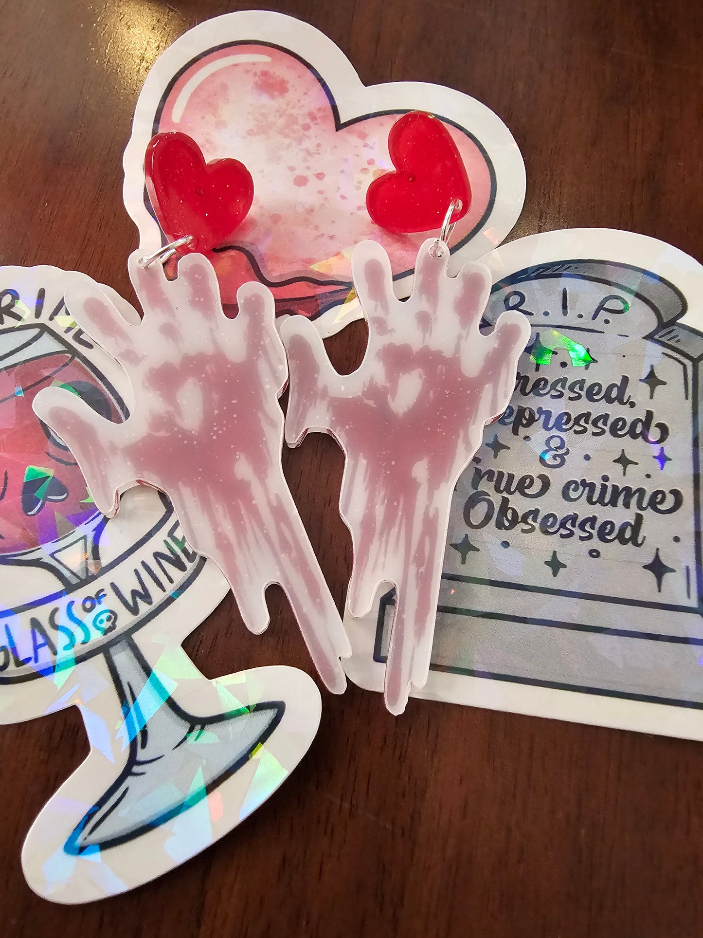 Bloody hand print earrings